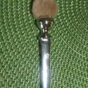 otter letter opener
featuring mama and baby otter papa and baby otter