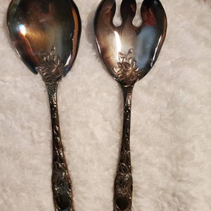 Vintage silver-plated serving spoon and fork.  Serving set.. Large size.  Length is 9 1/2 Iniches long.  By W A Italy.
