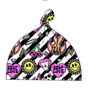 May include: Black and white striped baby hat with a knot on top. The hat has a colourful print of cherries, flames, smiley faces, lips, skulls, and the words "Self Love" and "Yeah".