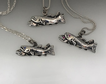 Two salmon pendant with gem eyes