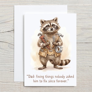 May include: A greeting card featuring a cartoon raccoon wearing glasses and a tool belt, holding tools. The card has the text: "Dad: fixing things nobody asked him to fix since forever."