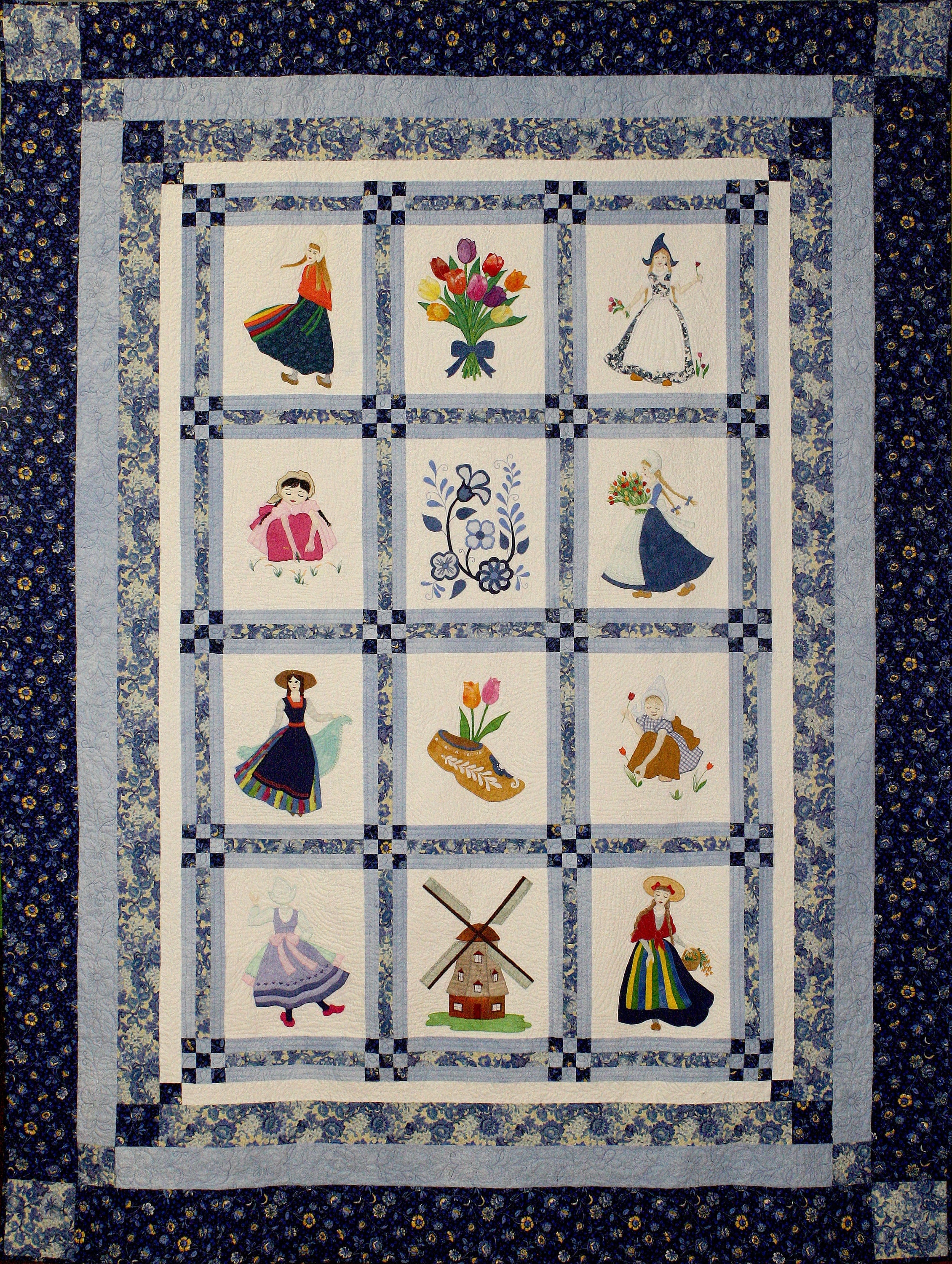 Dutch Applique or Embroidered Quilt Pattern with tulips, clogs, windmill and Dutch Girls. Dutch Meadows Single Bed Quilt Pattern