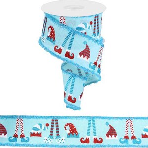 May include: Blue and red Christmas ribbon with a repeating pattern of elf legs and hats. The ribbon has a fuzzy texture.