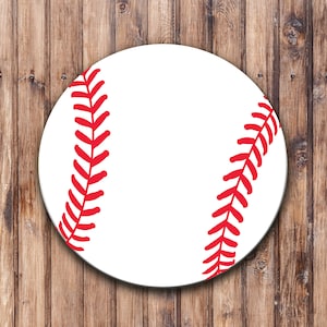 May include: A white baseball with red stitching. The baseball is on a wood background.
