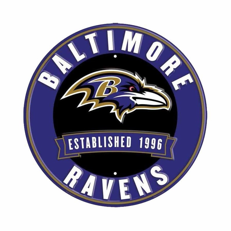 May include: A circular emblem featuring the Baltimore Ravens logo. The design includes a purple and gold raven head, the team name, and 