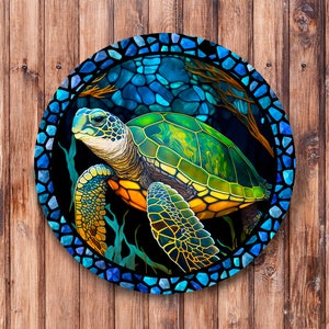 May include: A colorful mosaic-style round wall decor featuring a green sea turtle with yellow accents swimming in a blue and black ocean scene.