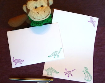 Briefpapierset met handgestempelde dinosaurus: groen en paars briefpapier