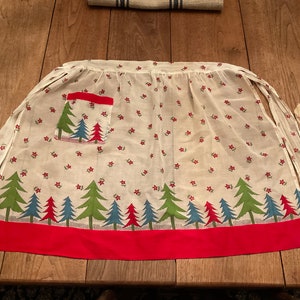 Vintage Ladies Christmas Apron, Half Apron with Ties, Green Red and Blue Christmas Trees with Red Poinsettia Accents