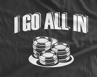 May include: Black t-shirt with white text that reads "I go all in" and a graphic of a stack of poker chips.