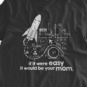 May include: Black t-shirt with a white graphic of a rocket ship and various mathematical equations. The text "if it were easy it would be your mom." is printed below the graphic.