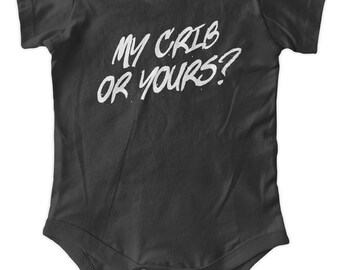 May include: Black baby onesie with white text that reads "My crib or yours?"