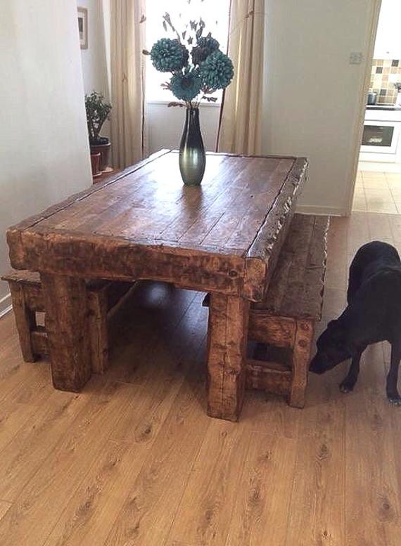 Chunky oak dining table with 2 benches