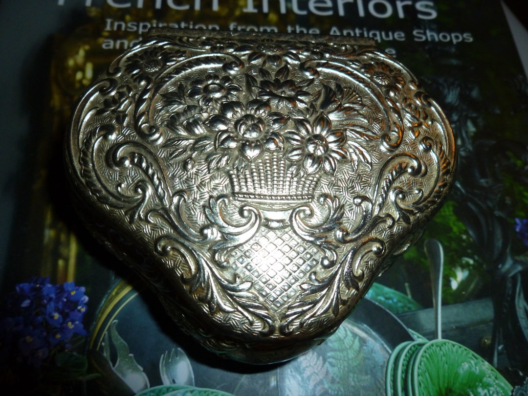 A Sweet and Small Vintage Silver Tone Jewelry Box With A