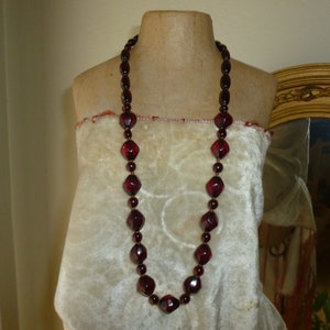 A Beautiful Vintage Cherry Amber Bakelite Necklace / Nice length At About 25 1/2 Inches Long / In Very Good Condition