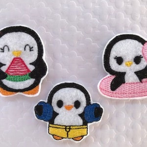 May include: Three embroidered penguin patches. One penguin is holding a watermelon slice, another is wearing a blue and white life preserver, and the third is riding a pink flamingo float.