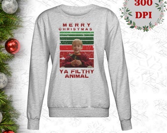 May include: A light gray sweatshirt with the text "MERRY CHRISTMAS YA FILTHY ANIMAL" in red and green. The design features a picture of a young boy. The sweatshirt is a long-sleeved crew neck.