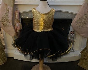 New year Christmas holiday black and gold sequin dress
