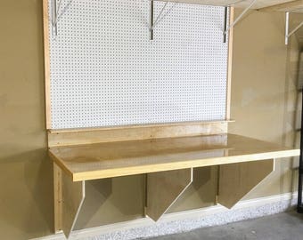 DIY Folding Workbench Plans - Easy to Follow Plans to build a sturdy space saving workbench for your garage, craft room, or shop.