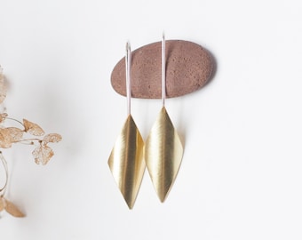 Long earrings in brass • silver ear wires • domed rhombus • geometrical leaf • soft volume • brushed finish •