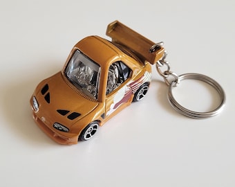 Tooned Toyota Supra Fast and Furious - Hot Wheels Die cast on Key Chain