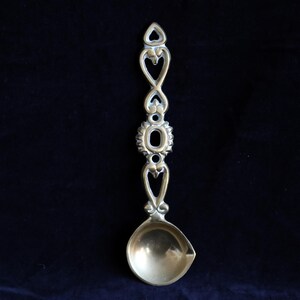 Vintage brass decorative serving spoon. image 2
