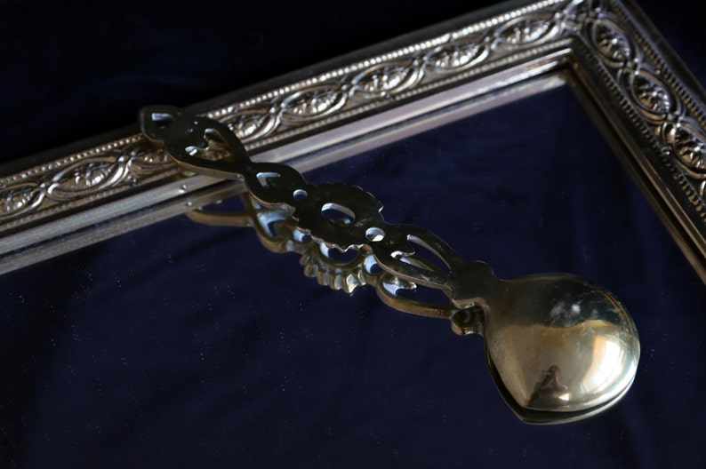 Vintage brass decorative serving spoon. image 4
