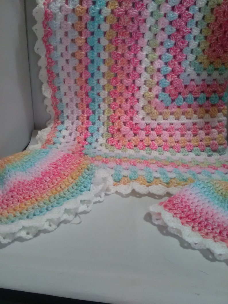 Hand crochet Baby pram blanket made in uk two sizes hats unisex colours White shell edge with two hats babies shawl variagated yarn