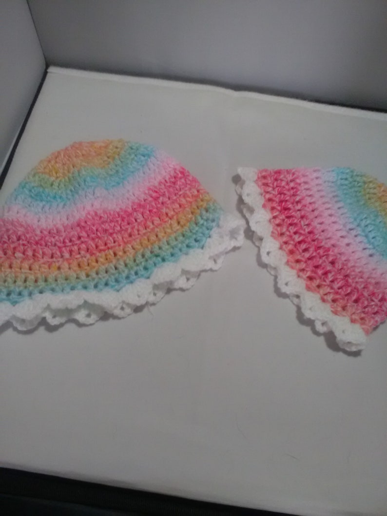 Hand crochet Baby pram blanket made in uk two sizes hats unisex colours White shell edge with two hats babies shawl variagated yarn