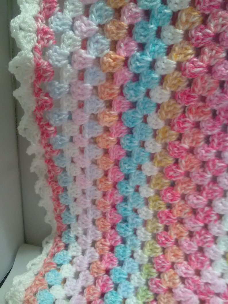 Hand crochet Baby pram blanket made in uk two sizes hats unisex colours White shell edge with two hats babies shawl variagated yarn