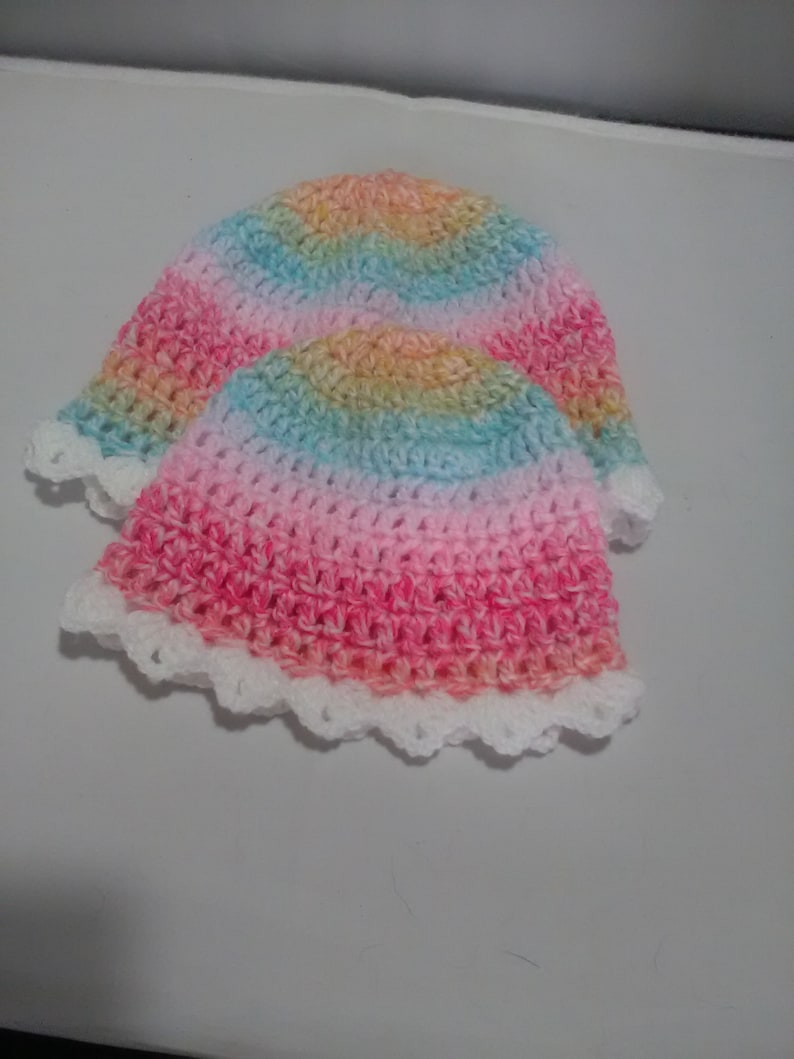 Hand crochet Baby pram blanket made in uk two sizes hats unisex colours White shell edge with two hats babies shawl variagated yarn