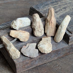 Ancient neolithic axe heads 3000-4000 year old stone tools knapped flint Vietnam Asia Antique collectible adze archaeological artifact