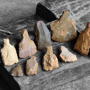 Ancient neolithic axe heads 3000-4000 year old stone tools knapped flint Vietnam Asia Antique collectible adze archaeological artifact