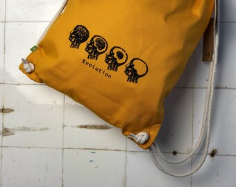 Yellow sturdy organic cotton canvas gymsac for shopping, sport bag, evolution graphic, gift for students bag backpack