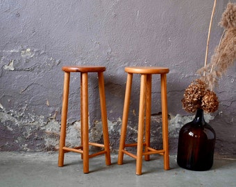 Pair of vintage high bar stools in Scandinavian vintage and boho chic style pine