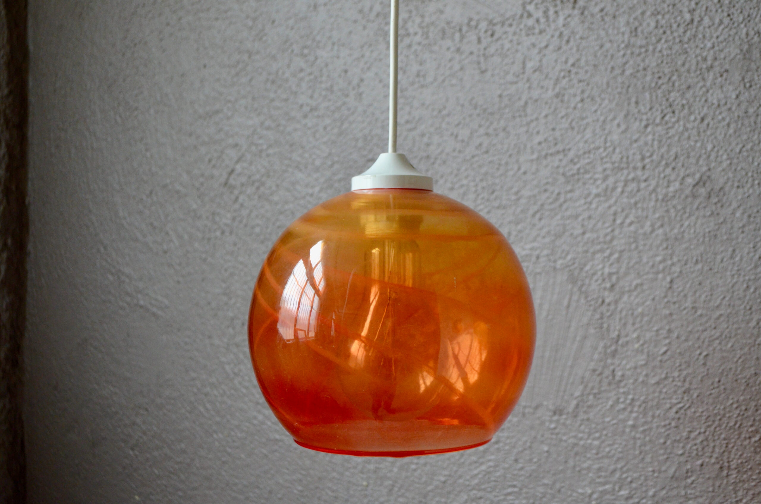 Orange glass pendant hotsell light