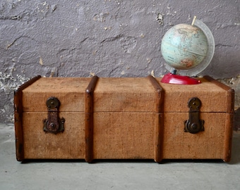 Old travel trunk or industrial boho and shabby chic style wooden chest