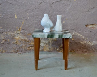 Pedestal plant holder or end of vintage sofa