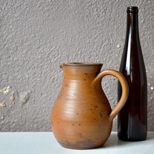 Jug pitcher or water pitcher in sandstone vintage boho and country chic style