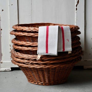 Antique farmhouse basket or wicker basket in boho farmhouse and country chic style, toy chest, laundry basket, possible lot