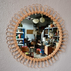 Large round sun mirror in vintage rattan and boho French style