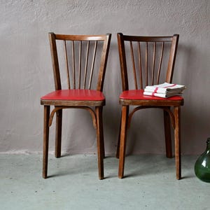 1950 Colette Gueden Rare fauteuil en Skaï vert surpiqué noir