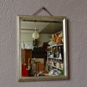 Vintage barber mirror in chrome metal from the 40s art deco style boho