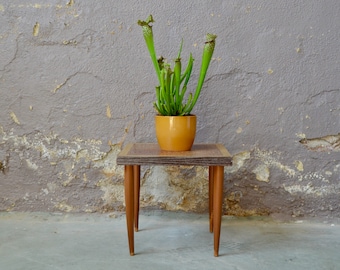 Pedestal table with plants or vintage sofa tip