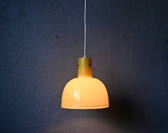 Scandinavian vintage chandelier or pendant lamp in yellow opaline glass. Vintage boho and modernist style