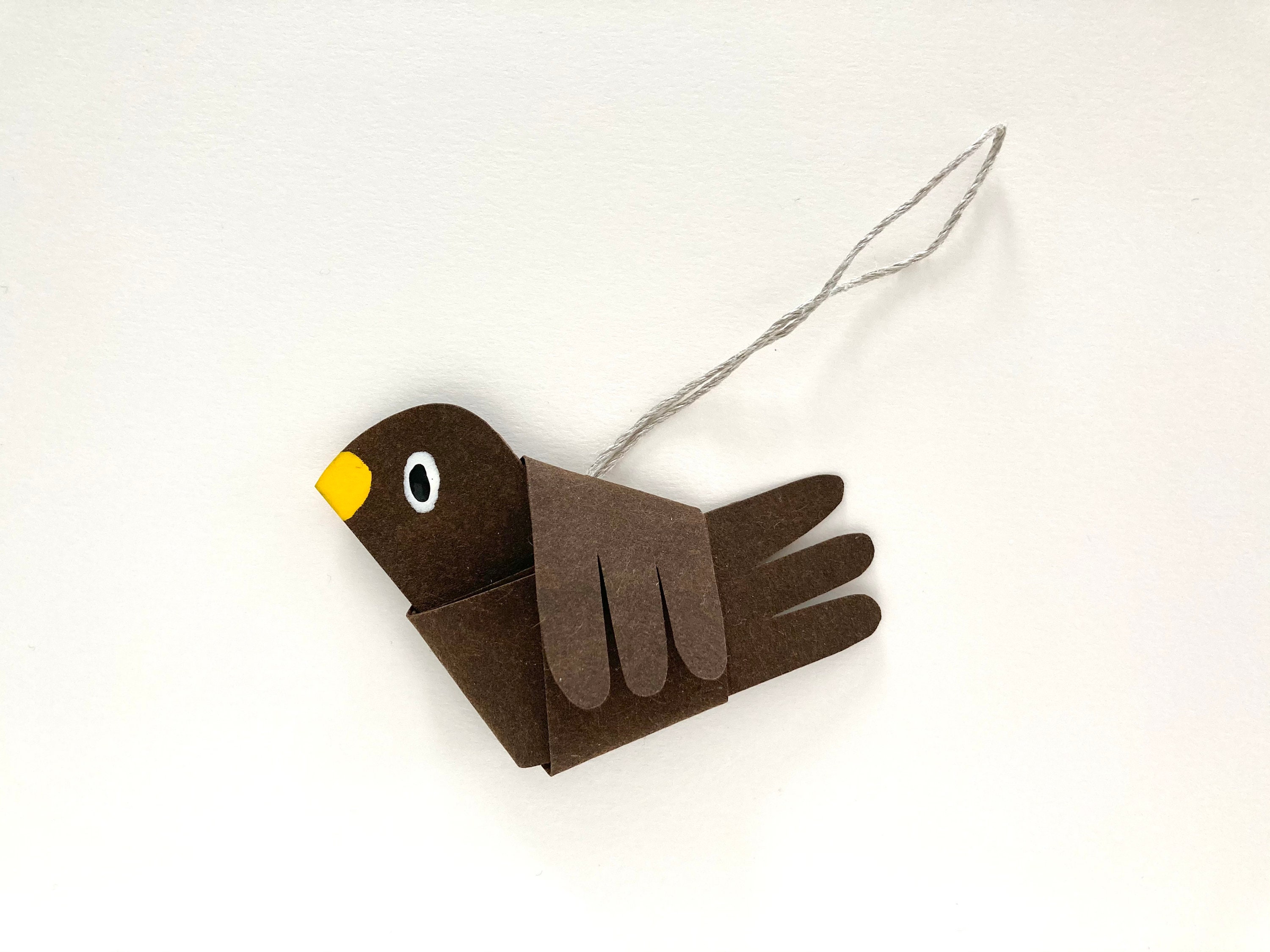 Decorative pendant "little bird" in brown (conditionally weatherproof) shrub decoration with linen cord approx. 8 cm