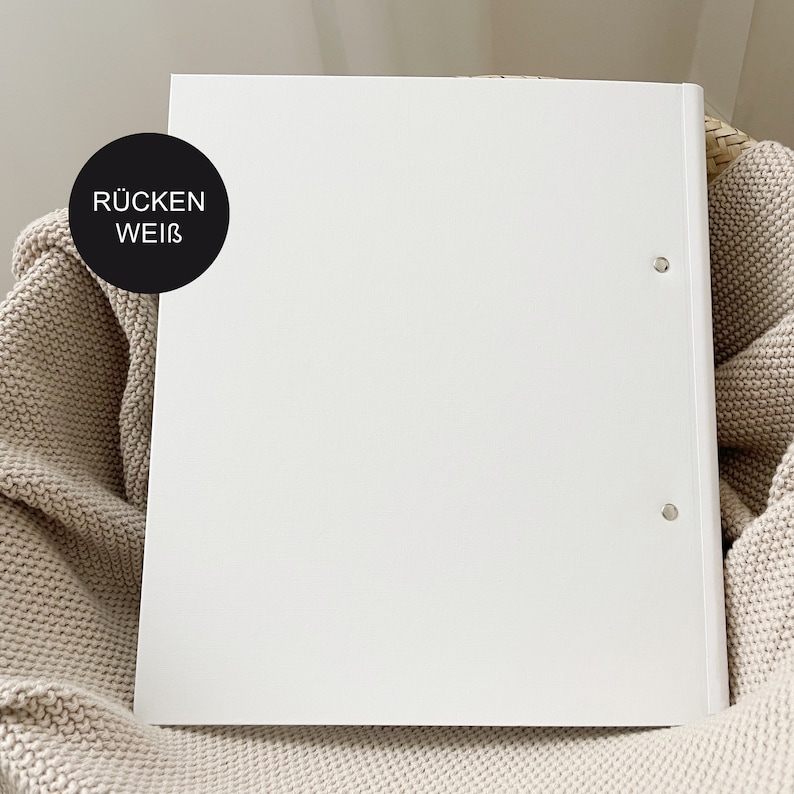 May include: White binder with a black circle label that says "R&Uuml;CKEN WEI&szlig;".