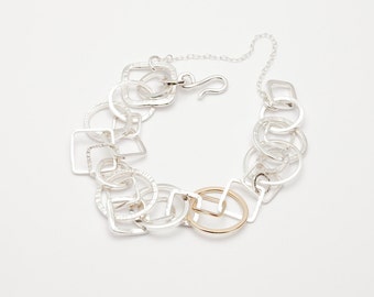 Albaicin by Fedha - organic collection of hand-forged square and circular links in sterling silver and rose gold, hammered, polished, satin
