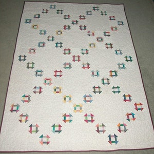 Delicate Churn Dash Irish Chain Quilt Pattern