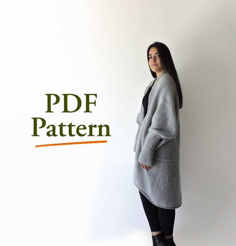 May include: A PDF pattern for a gray knitted cardigan with long sleeves and a relaxed fit. The text "PDF Pattern" is written in green letters on a white background.