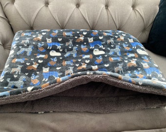 Cozy padded sleeping bags for dogs, cats and small animals